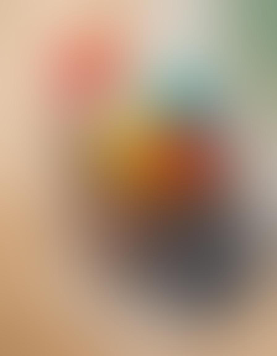 A sun-kissed beach scene showcasing a diverse group of friends enjoying a vibrant summer day, wearing trendy swimwear and stylish beach outfits. Include colorful beach umbrellas, a sparkling ocean with gentle waves, and playful beach activities like frisbee and beach volleyball. The atmosphere should exude joy and relaxation, capturing the essence of summer vibes. bright colors. tropical theme. super-realistic.